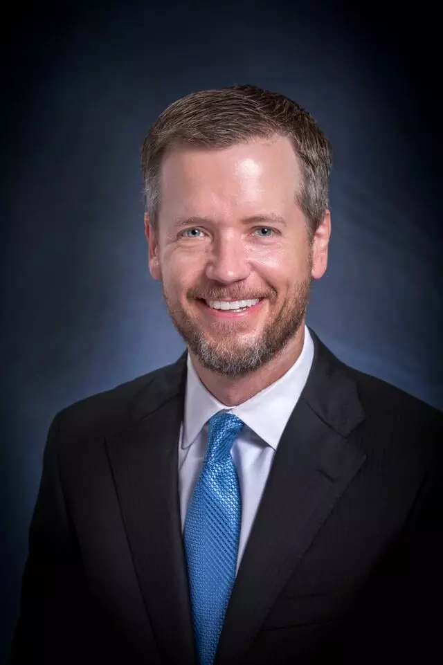 John E McDonald, MD